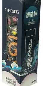 Anime-themed smart thermos water bottle with LED temperature display in retail packaging.