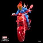 Marvel Legends Series Ghost Rider action figure riding a red motorcycle with translucent orange flame head.