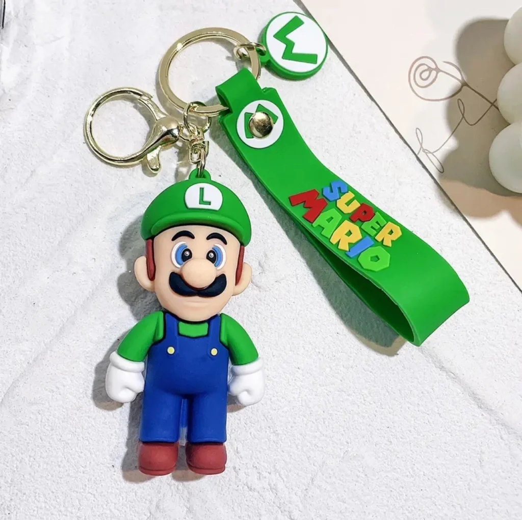 Luigi from Super Mario character keychain with green strap and gold keyring.